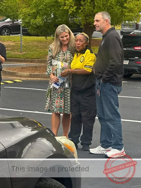 Community Unites to Gift Ms. Len a New Life with Car Donation at Flowery Branch High School